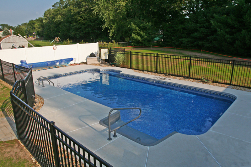 Swimming pool and hand finished concrete project example 24